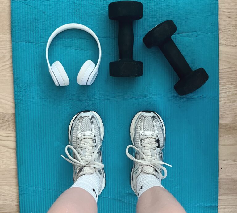 exercise mat and sneakers