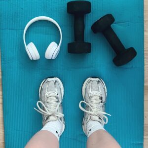 exercise mat and sneakers