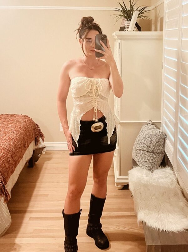 outfit with boots, chunky belt, and mini skirt